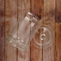 La Rochere Jar with its Lead on Wood Table