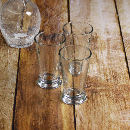 La Rochere Three Long Glasses Drink Abeille on Wood Table