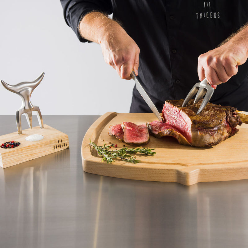 comfortable grip carving fork and a knif cutting meet